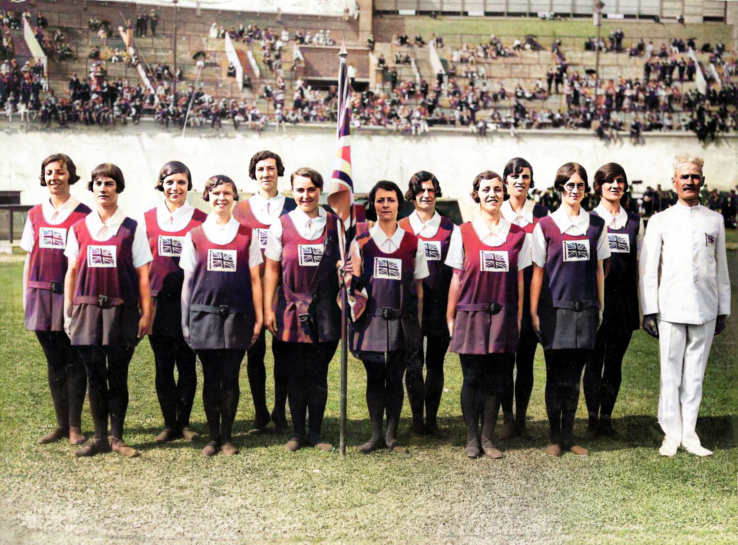 The 1928 GB women's team presenting with flag in Amsterdam - photo BG ARCHIVE