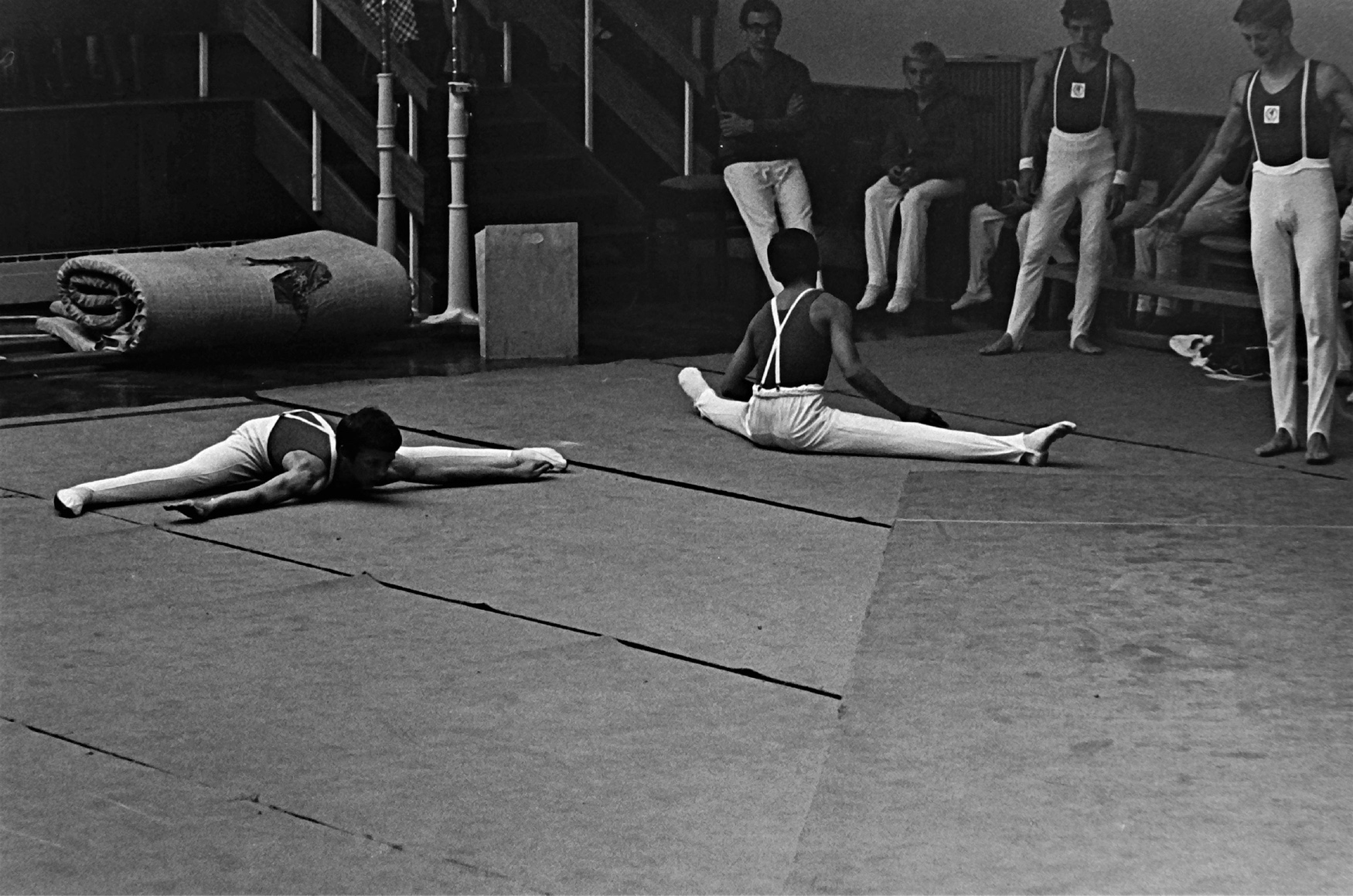1965, Jeff at the Gymnaestrada doing his box splits. Alan Chandra right