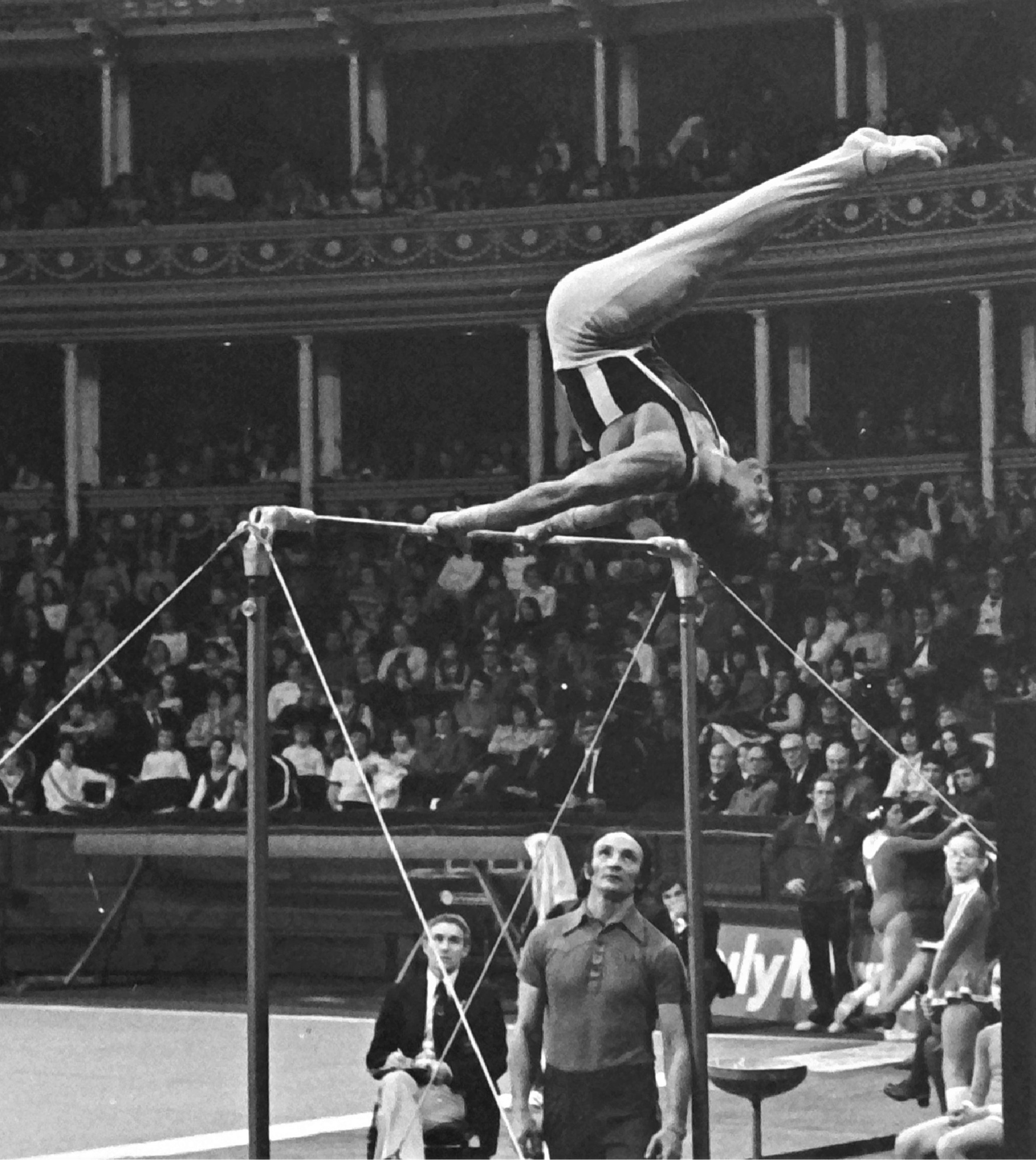Jeff competing in the Champion’s Cup on High Bar at the Albert Hall in 1976 with coach Dick Gradley. He won this event in this year and again in 1980