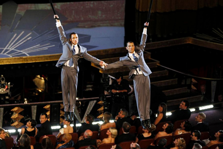 Performing at the 84th Academy Awards - Kevin on left and twin Andrew right