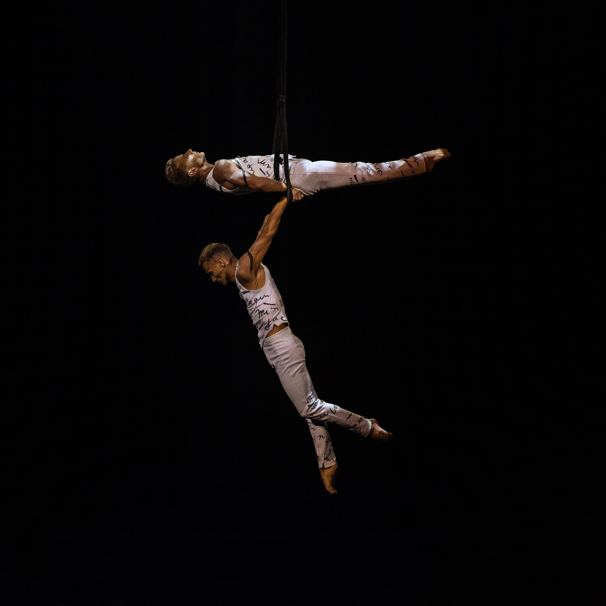 Performing in 'Joya' with Cirque du Soleil - Kevin above and twin Andrew below